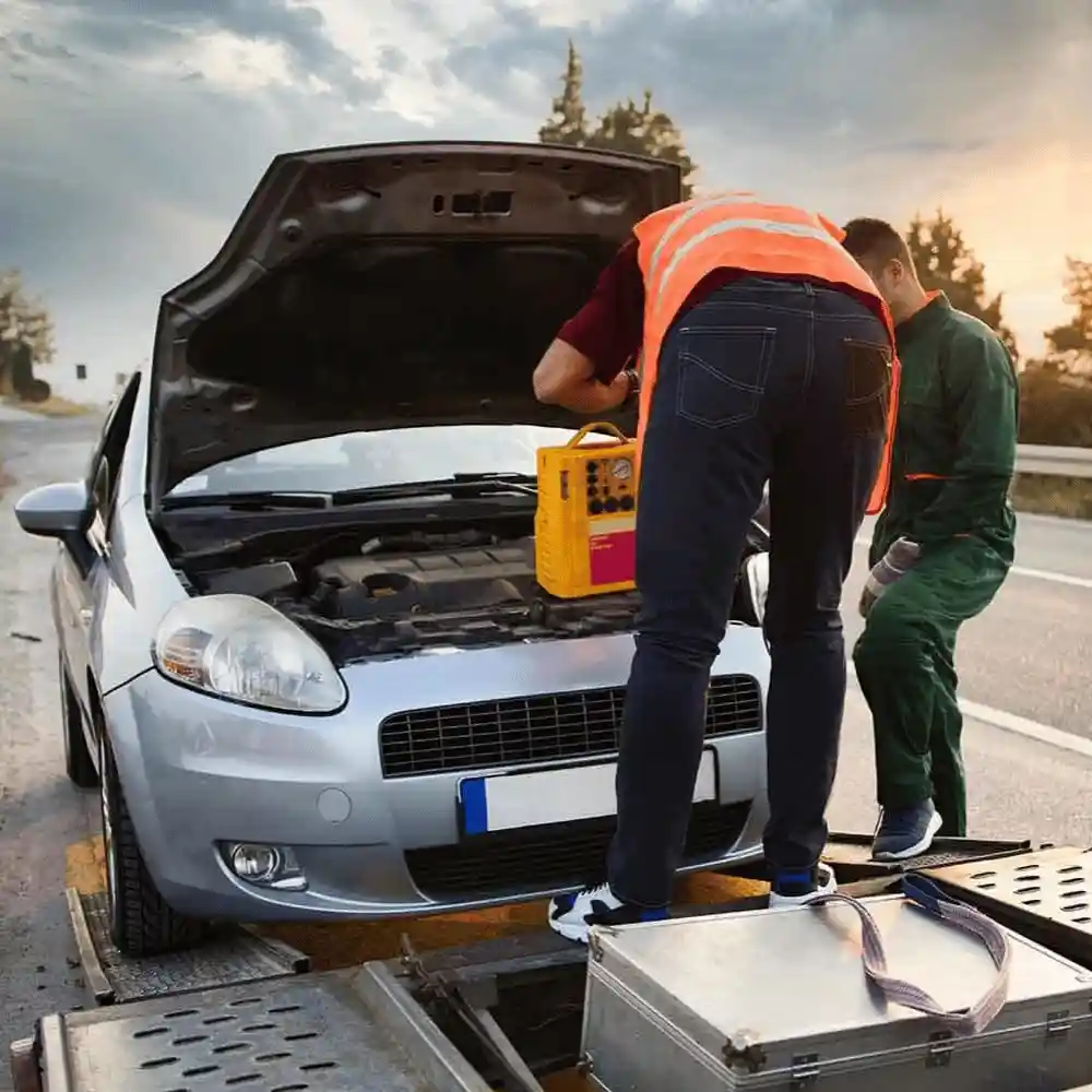 Certified mechanic providing roadside assistance for car breakdown in Calgary