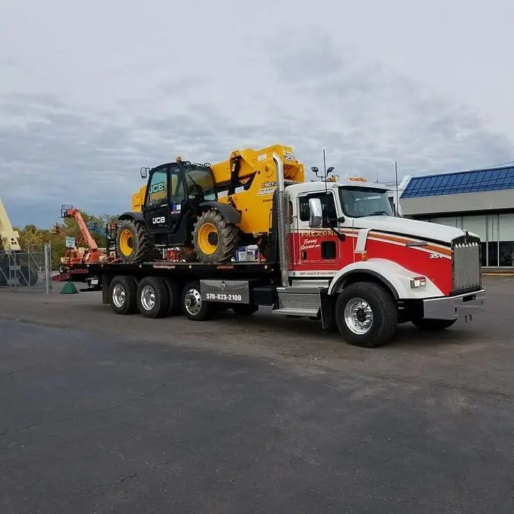 Tow Truck Calgary heavy duty flatbed tow truck providing highway recovery service